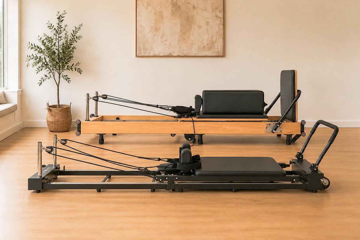 Steel vs. Wooden Pilates Reformers: An Honest Comparison